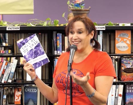 Janet with the book “Part of my Pain” at Recycled Reads 10/21/17