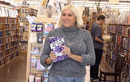 Janet with the book “Part of my Pain” at Half Price Books 11/1/17