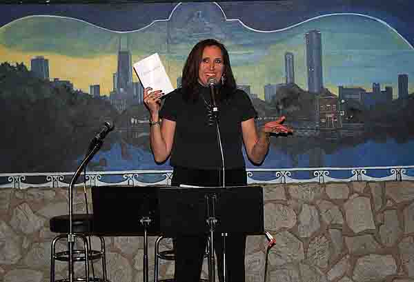 Janet reaing at “the Cafe Gallery#&8221' open mike at Gallery Cabaret April 25th, 2012