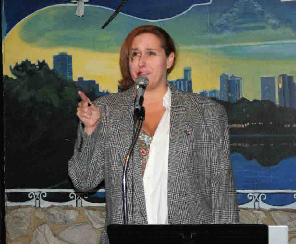 Janet Kuypers on stage, photographed by John Yotko