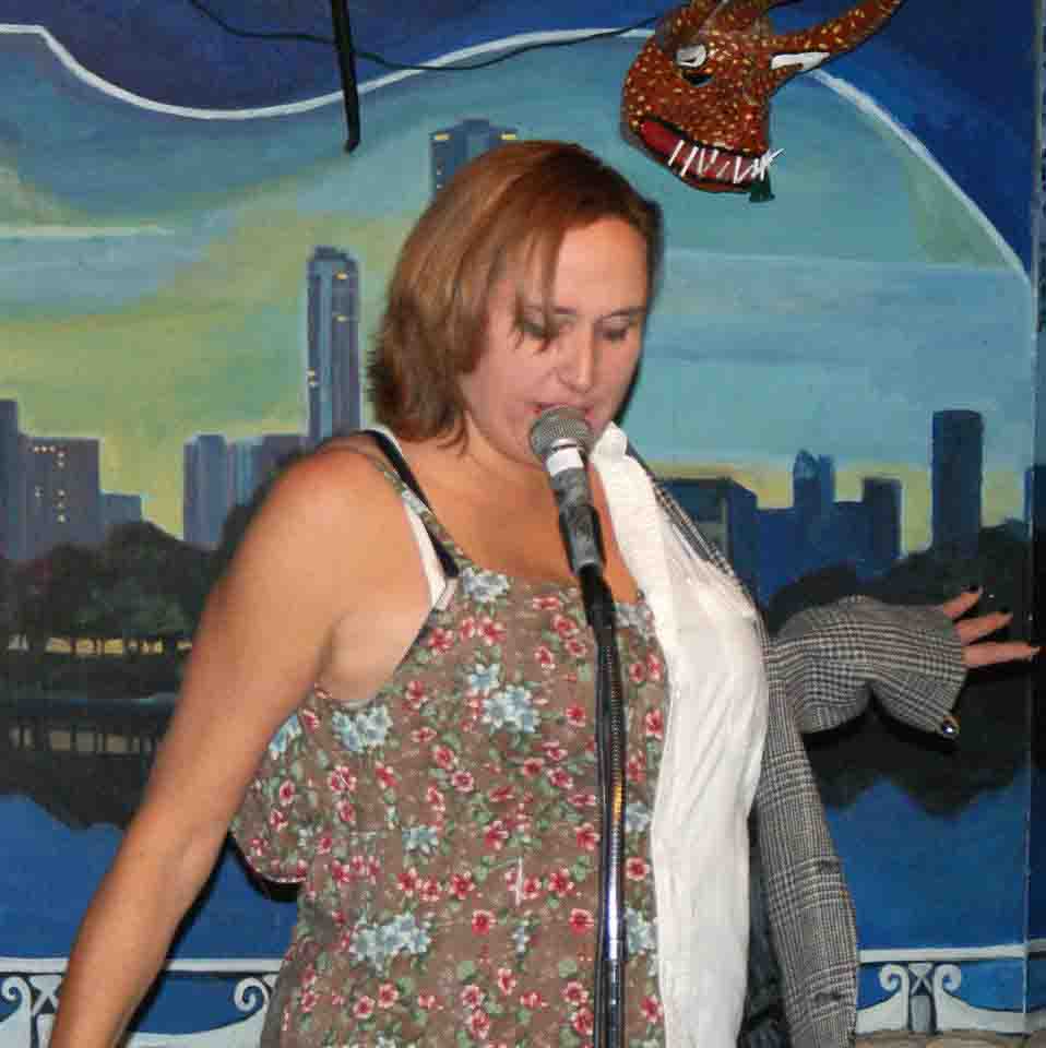 Janet Kuypers on stage, photographed by John Yotko