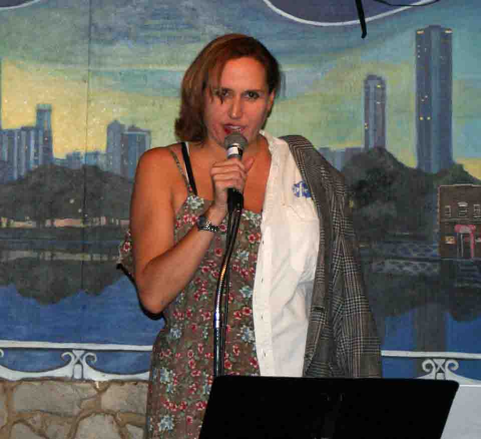 Janet Kuypers on stage, photographed by John Yotko